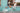 Fille de 6 ans assise à côté de son vélo léger Bebikeen 16 pouces bleu turquoise avec panier en osier et béquille, portant un casque bleu turquoise assorti.