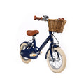 Vélo enfant Bebikeen 12 pouces bleu marine, 2 à 4 ans, vue 3/4 avant avec panier.