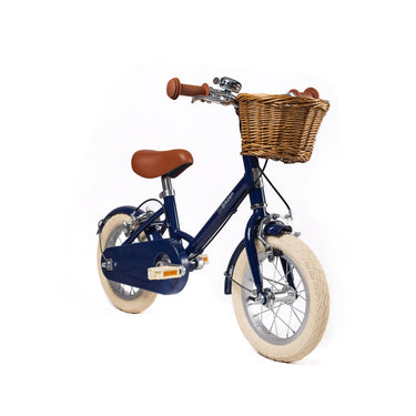 Vélo enfant Bebikeen 12 pouces bleu marine, 2 à 4 ans, vue 3/4 avant avec panier.