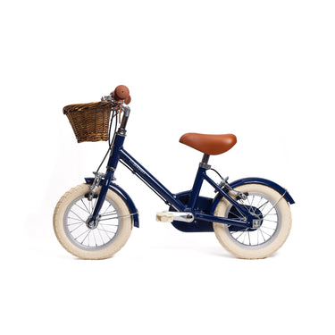 Vélo enfant Bebikeen 12 pouces bleu marine, 2 à 4 ans, profil gauche avec roues stabilisatrices.