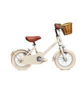 Vélo enfant Bebikeen 12 pouces crème pour enfants de 2 à 4 ans, léger, élégant, et sûr avec panier en osier naturel, vue de profil droit.
