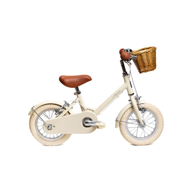Vélo enfant Bebikeen 12 pouces crème pour enfants de 2 à 4 ans, léger, élégant, et sûr avec panier en osier naturel, vue de profil droit.
