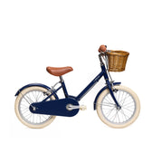 Vélo enfant BeBikeen 16 pouces bleu marine pour enfants de 4 à 6 ans, léger, élégant et sûr avec panier en osier naturel, vue de profil droit.