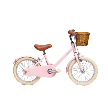 Vélo enfant BeBikeen 16 pouces rose pour enfants de 4 à 6 ans, léger, élégant et sûr avec panier en osier naturel, vue de profil droit.
